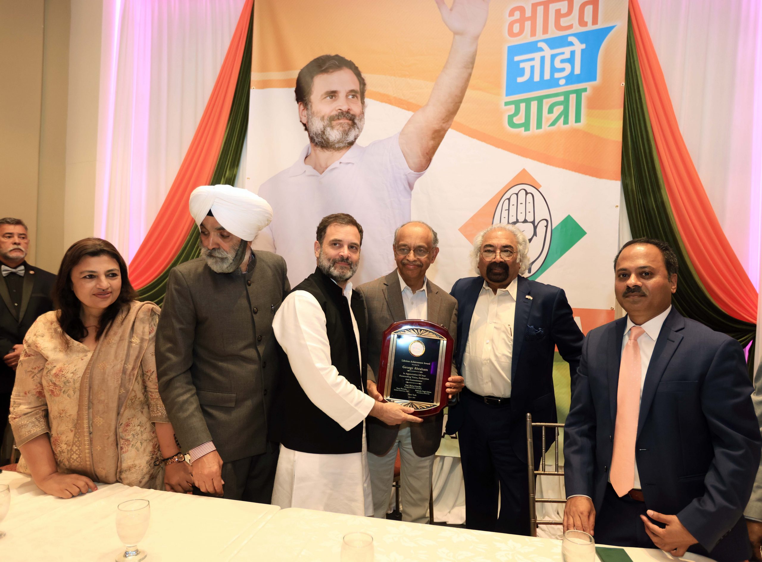 Indian Overseas Congress George Abraham Vice Chair IOC is being given the life time achivement Award for his sevices to the community by Rahul Gandhi at an event held at Queens-New York on june 3rd 2023,Sam Pitroda,Pradeep Samala IOC Conviner and working president and Mohinder Singh President can be seen in Pic....Pic Mohammed Jaffer-SnapsIndia